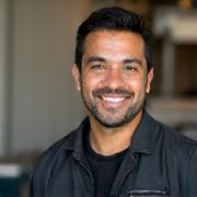 Professional headshot of David Martinez, Cat Grooming Expert.